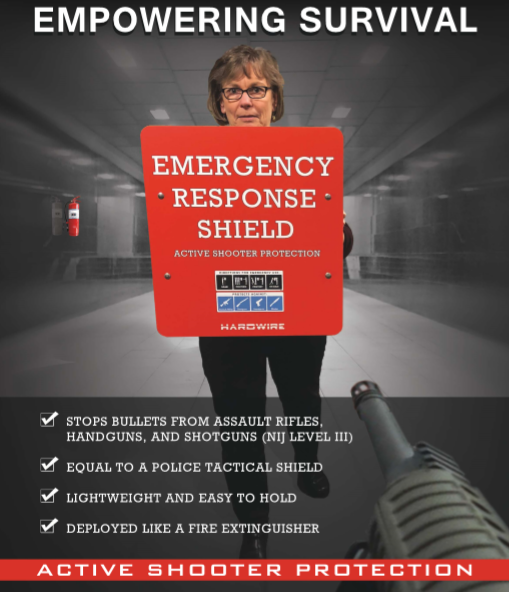 A woman holding a shield intended to protect against an active shooter